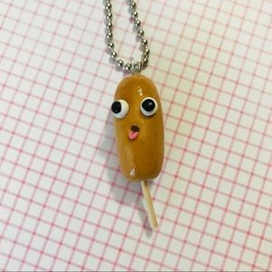 Adorable handmade goofy corn dog keychain